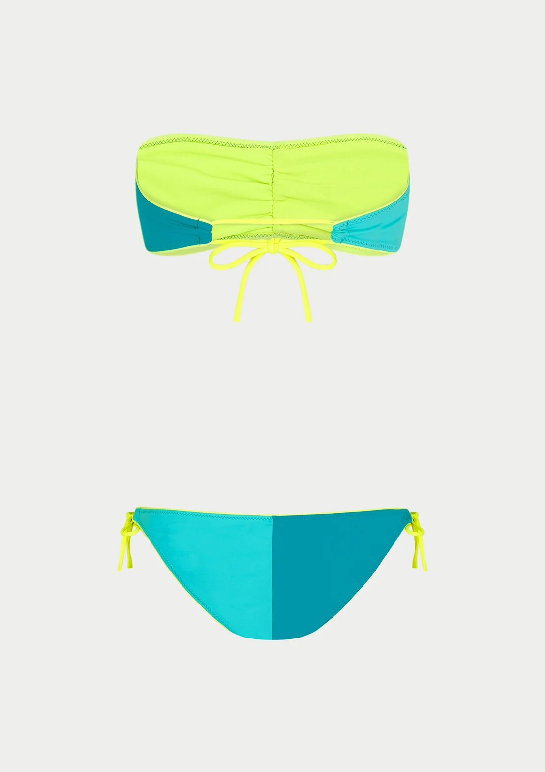 Silueta parte trasera del bikini bandeau para mujer y teen colorblock varios azules y contrastes amarillo flúor de To the Moon.