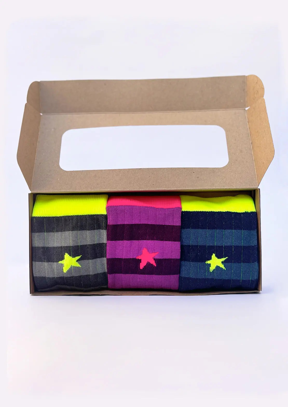 Caja de 3 pares de calcetines de To the Moon en canalé con rayas de caña baja con toques en neón.
