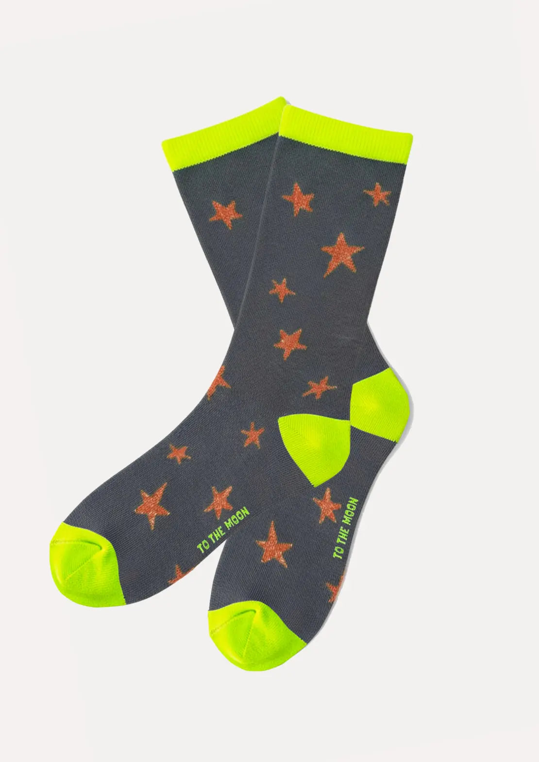 Calcetines de To the Moon de caña baja con grises estrellas de lúrex teja y contrastes amarillo flúor. Ideales para teens